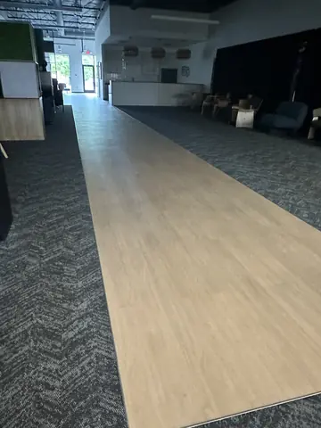 Wood-look flooring through the finished commercial interior.