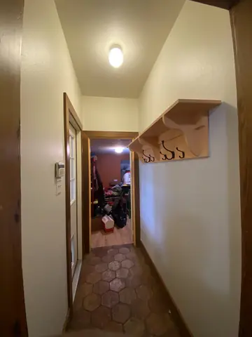 Hallway, ceiling, and trim photographed during interior painting.