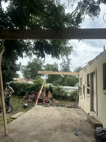 View along the side of the home during roof and addition work.