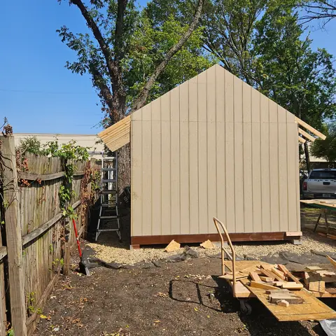 End elevation of the storage building during construction.