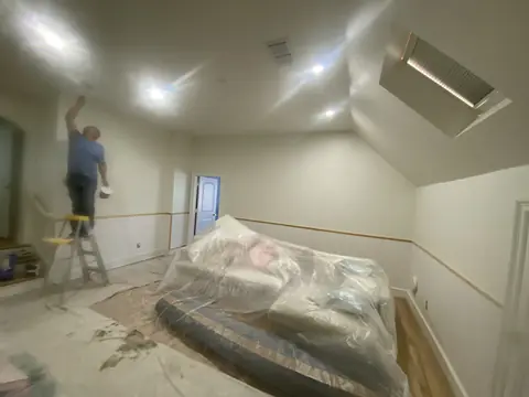 Ceiling finishing in progress above the protected living area.